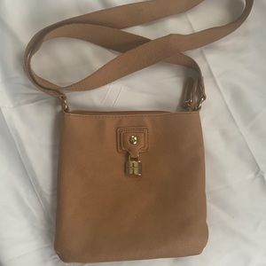 Dimensions: 7 x 7 x 9 1/2 inches. Small scratch on tommy lock.